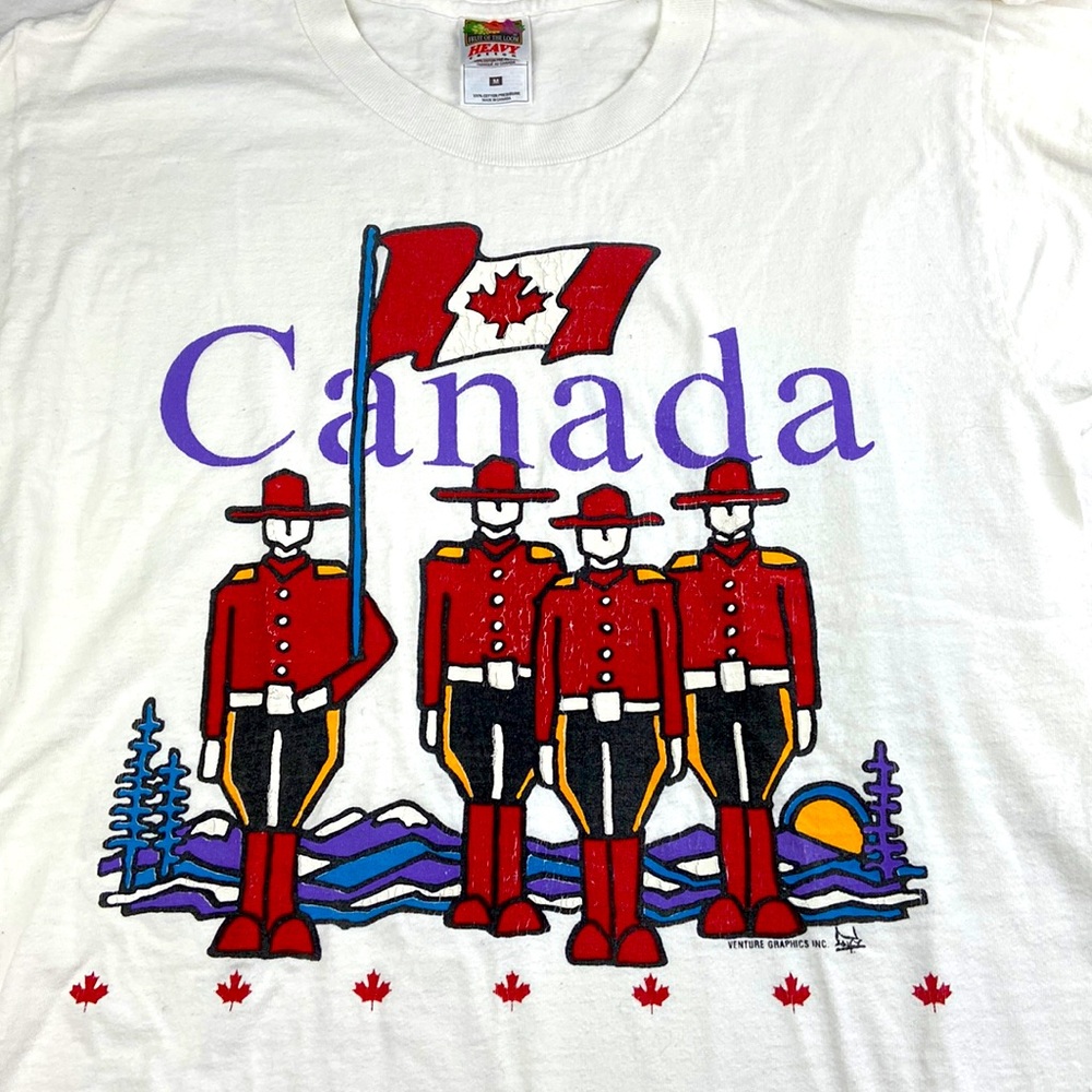 Vintage 100% cotton Canada tee graphic featuring Canadian Mounties worn charm